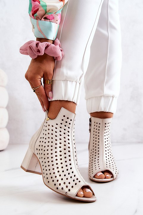 Perforated ankle boots