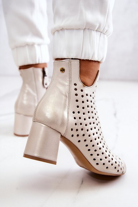 Perforated ankle boots